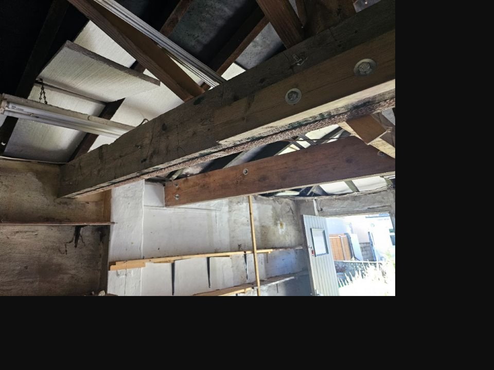 Structural alteration and load path assessed during a building survey